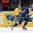 MINSK, BELARUS - MAY 16: Slovakia's Martin Marincin #52 charges up ice with Sweden's Joakim Lindstrom #12 and Mikael Backlund #60 chasing during preliminary round action at the 2014 IIHF Ice Hockey World Championship. (Photo by Richard Wolowicz/HHOF-IIHF Images)
